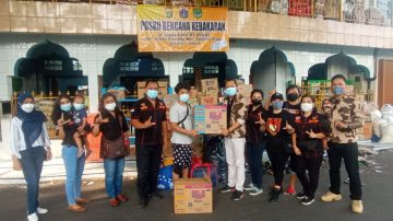 LSM Laskar Manguni Indonesia Bagikan Paket Sembako ke Korban Bencana Kebakaran  Warga Lagoa Kanal Kebon Bawang